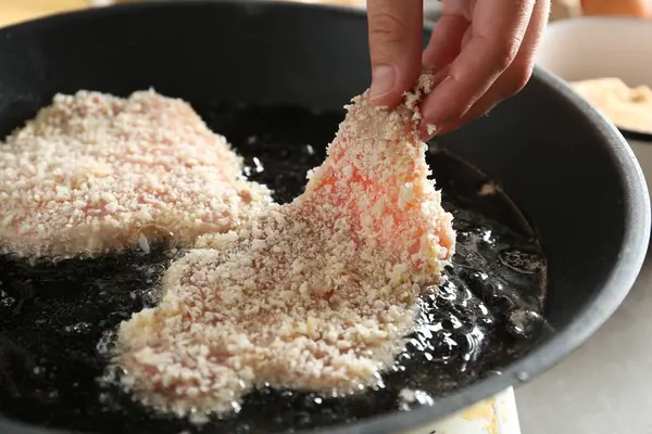 Cooking Schnitzel Woman Putting Raw Pork Chop Bread Crumbs Frying — Stock Photo, Image