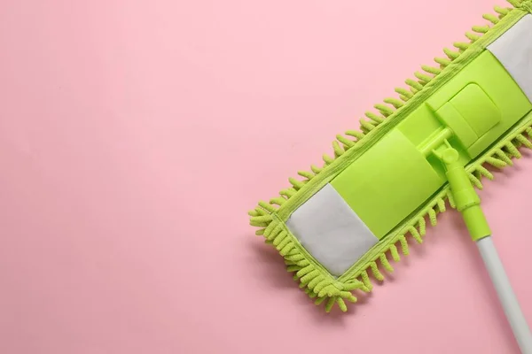 Mop Plastic Handle Pink Background Top View Space Text — Stock Photo, Image