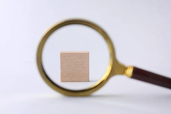 Wooden Cube White Background View Magnifying Glass — Stock Photo, Image