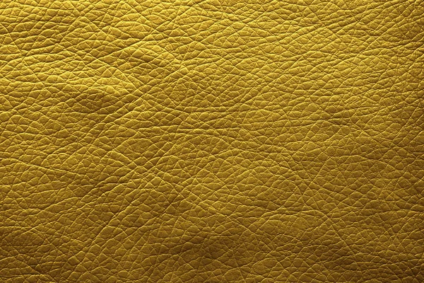背景として光沢のある黄金の表面のクローズ アップ ビュー — ストック写真