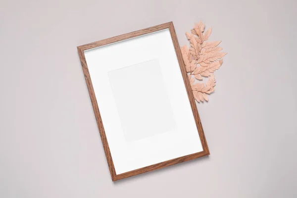 Empty Photo Frame Decorative Leaf Light Gray Background Flat Lay — Stock Photo, Image