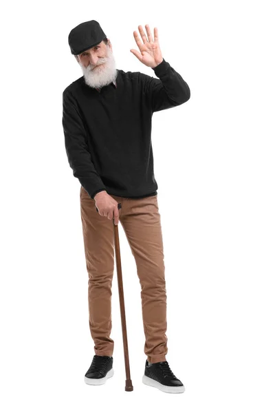 白い背景に杖を振ってシニア男 — ストック写真