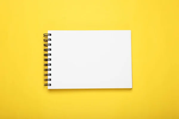 Open Blank Notebook Yellow Background Top View — Stock Photo, Image