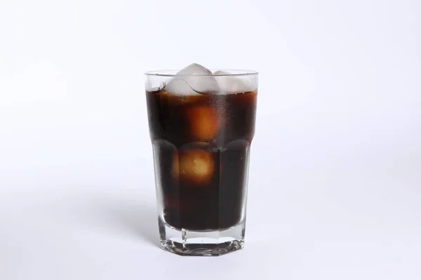 Refreshing iced coffee in glass isolated on white