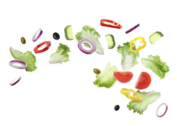 Lettuce Leaves Olives Cut Cucumber Onion Bell Peppers Tomato Falling — Stock Photo, Image