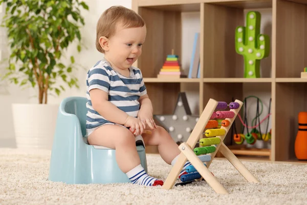 Little Child Abacus Sitting Plastic Baby Potty Indoors — Stock Photo, Image