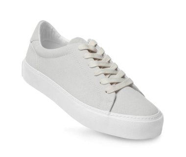 Beyazda izole edilmiş şık bir bej ayakkabı.