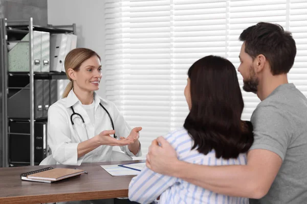 stock image Couple having appointment with fertility doctor in clinic. Patient consultation