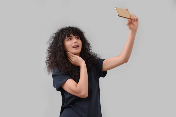 Beautiful Young Woman Taking Selfie Light Grey Background — Stock Photo, Image
