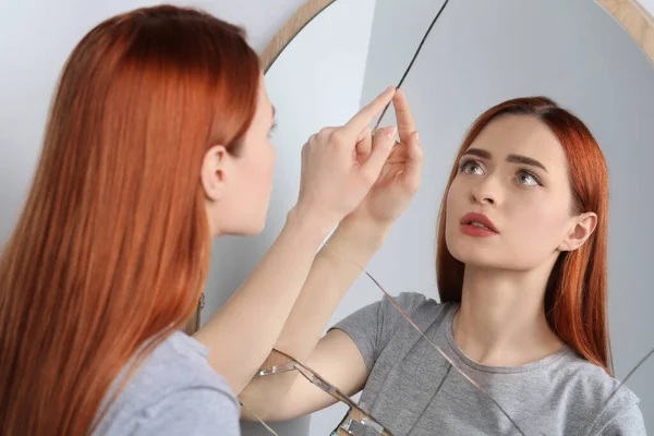 Sad Young Woman Suffering Mental Problems Broken Mirror Indoors — Stock Photo, Image