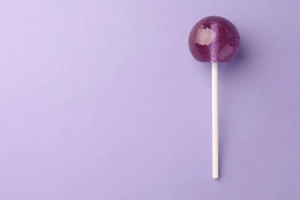 Tasty Lollipop Violet Background Top View Space Text — Stock Photo, Image