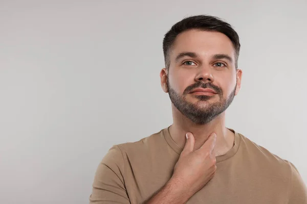 Endocrine System Man Doing Thyroid Self Examination Light Grey Background — Stock Photo, Image
