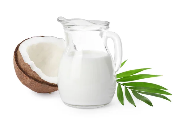 おいしいビーガンミルク ココナッツと白の背景に葉のガラス瓶 — ストック写真
