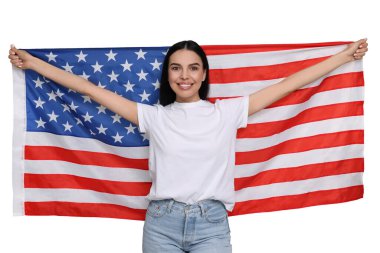 4 Temmuz - Amerika 'nın Bağımsızlık Günü. Amerika Birleşik Devletleri bayrağını beyaz arka planda tutan mutlu kadın