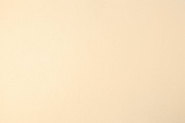 Arka plan olarak bej kağıt yaprağının dokusu, üst görünüm