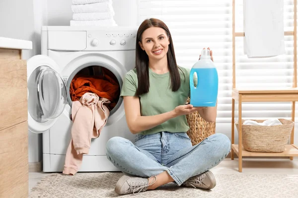 Woman Sitting Floor Washing Machine Holding Fabric Softener Bathroom — Stock Photo, Image