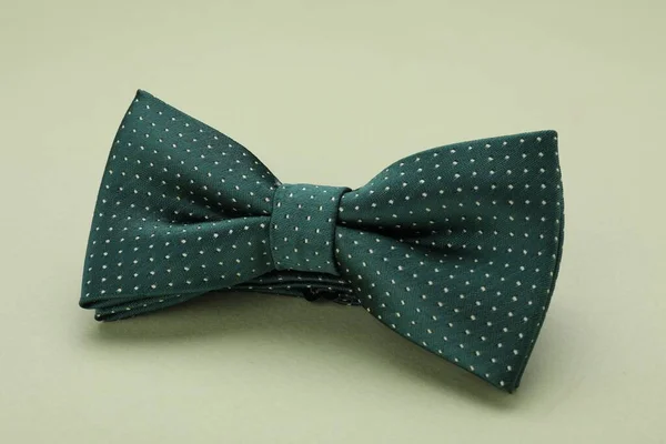 Stylish Bow Tie Polka Dot Pattern Pale Green Background Closeup — Stock Photo, Image