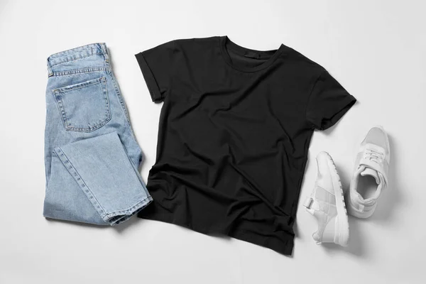 Stylish Shirt Jeans Sneakers White Background Flat Lay — Stock Photo, Image