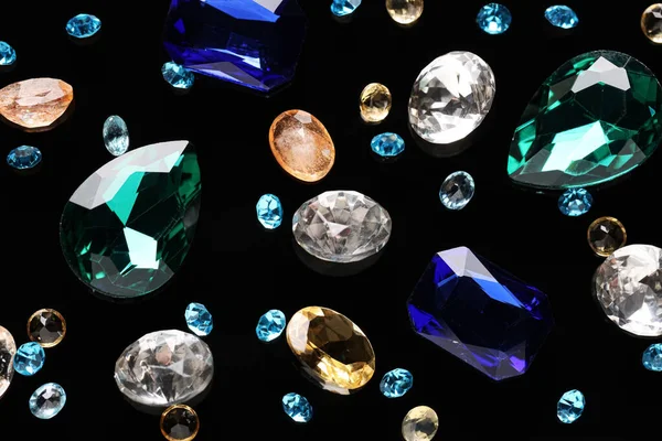 Different Beautiful Gemstones Jewelry Black Background Flat Lay — Stock Photo, Image