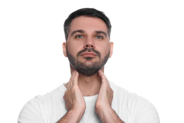内分泌系 白地で甲状腺自己検査をする男 — ストック写真