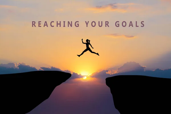 Concept Reaching Life Business Goals Silhouette Woman Jumping Chasm Sunrise — Stock Photo, Image
