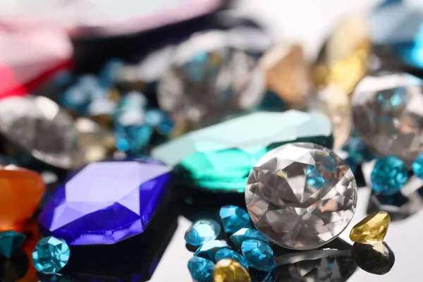 Different Beautiful Gemstones Jewelry Mirror Surface Closeup — Stock Photo, Image