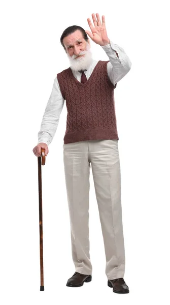 Älterer Mann Mit Gehstock Winkt Auf Weißem Hintergrund — Stockfoto