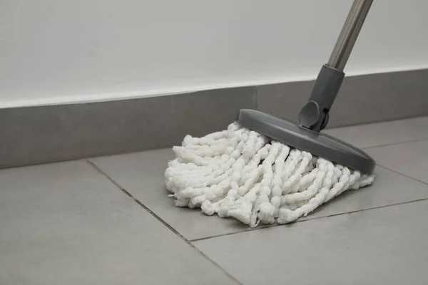 Cleaning Grey Tiled Floor String Mop Closeup Space Text — Stock Photo, Image