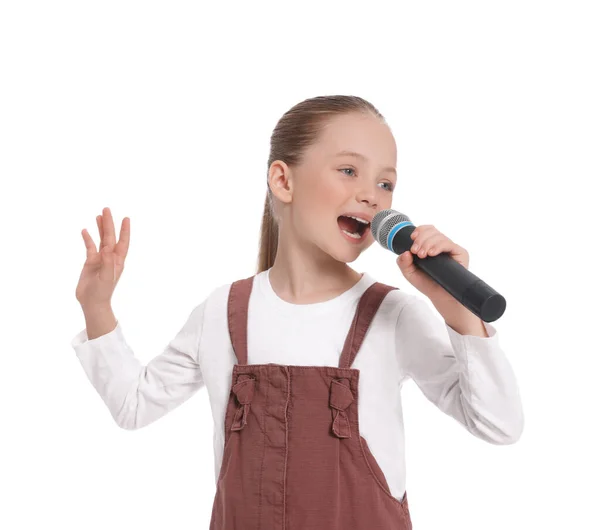 Nettes Kleines Mädchen Mit Mikrofon Singt Auf Weißem Hintergrund — Stockfoto