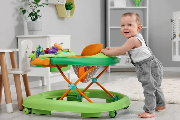 Cute Baby Making First Steps Toy Walker Home — Stock Photo, Image