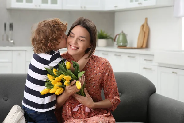 Little Son Kissing Congratulating His Mom Mother Day Home Woman — Foto de Stock