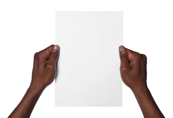 African American Man Holding Sheet Paper White Background Closeup Mockup — Stock Photo, Image