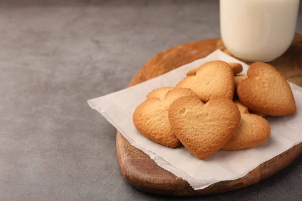 stock image Heart shaped Danish butter cookies on grey table, closeup. Space for text