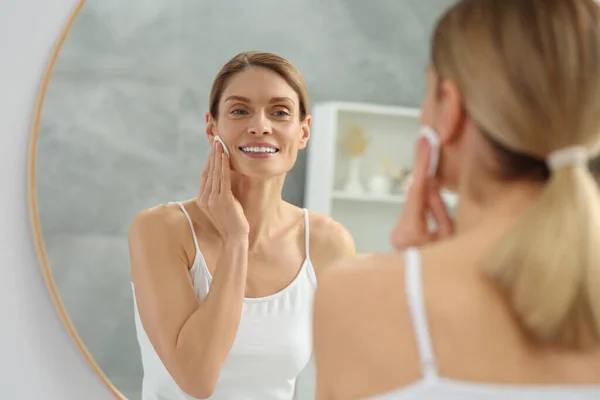 Beautiful Woman Removing Makeup Cotton Pad Mirror Indoors — Stock Photo, Image