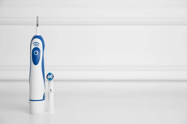 Electric Toothbrush White Background Space Text — Stock Photo, Image