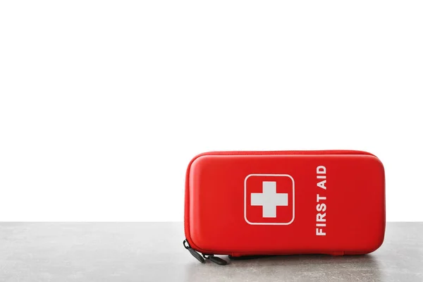 First Aid Kit Light Grey Table White Background — Stock Photo, Image