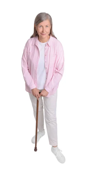stock image Senior woman with walking cane on white background, above view