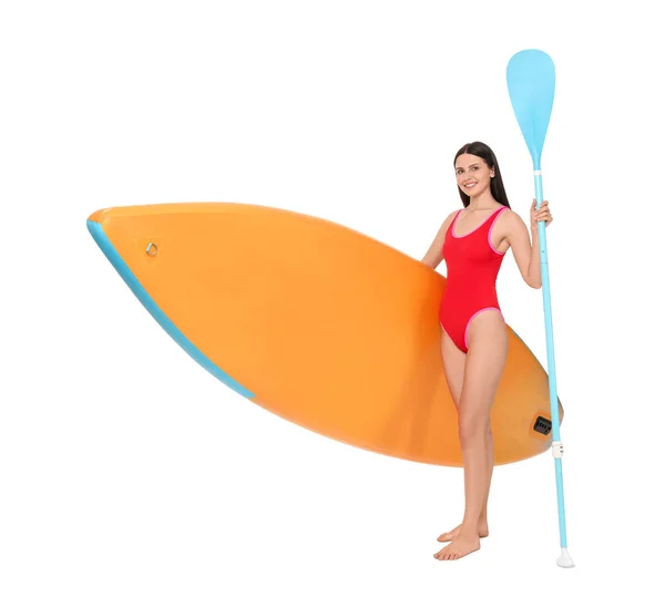快乐的女人 有橙色的Sup板 白色背景的桨 — 图库照片