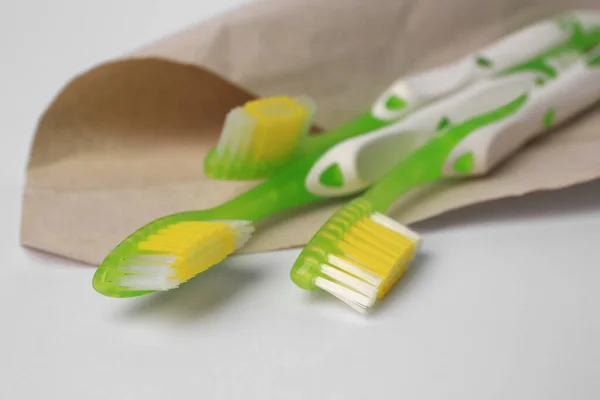 Light Green Toothbrushes White Background Closeup — Stock Photo, Image