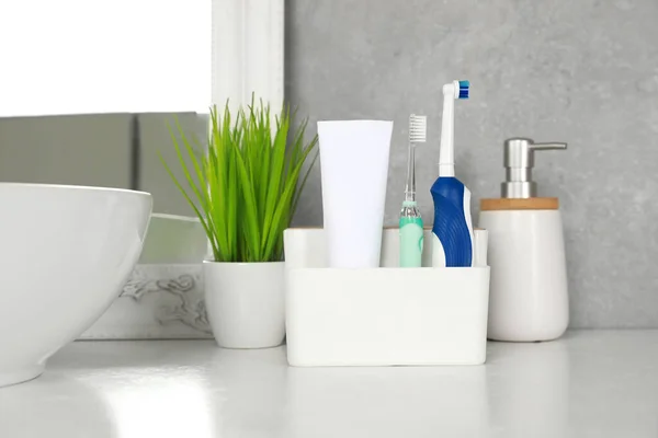 Electric Toothbrushes Tube Paste White Countertop Bathroom — Stock Photo, Image
