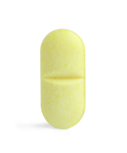 Una Pillola Gialla Isolata Sul Bianco Trattamento Farmacologico — Foto Stock