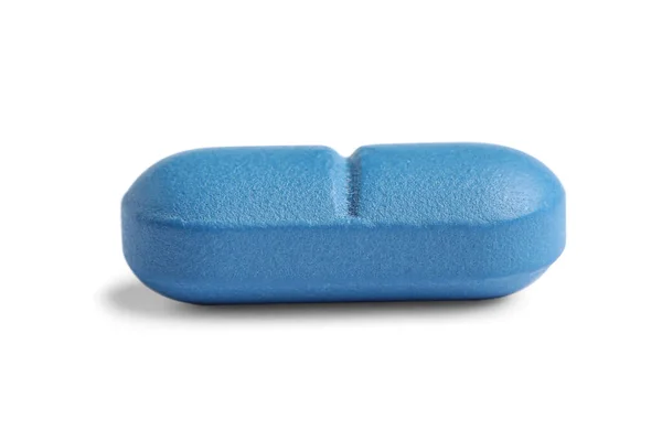 白い背景に青い錠剤が１錠 医学的治療 — ストック写真