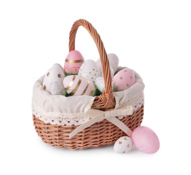 Wicker basket with beautifully painted Easter eggs isolated on white