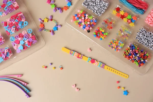 Handmade Jewelry Kit Kids Colorful Beads Wristbands Beige Background Flat — Stock Photo, Image