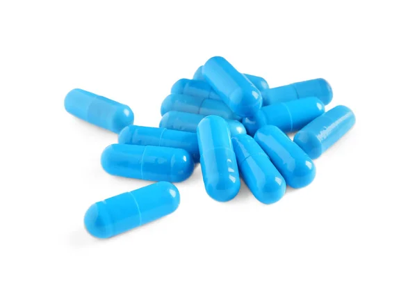 Hromada Modrých Pilulek Bílém Pozadí — Stock fotografie