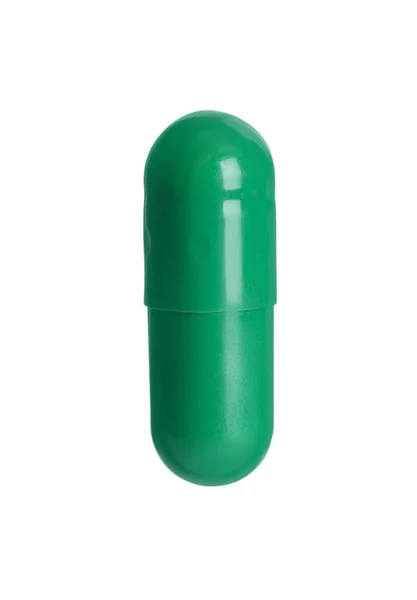 Una Pillola Verde Sfondo Bianco Trattamento Farmacologico — Foto Stock