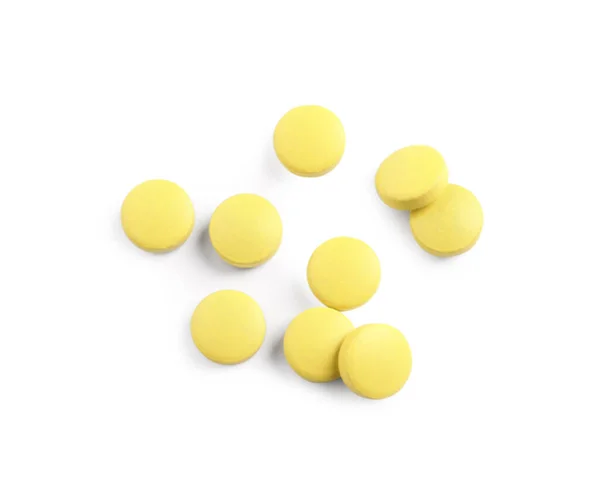 Viele Gelbe Pillen Isoliert Auf Weißem Grund Draufsicht — Stockfoto