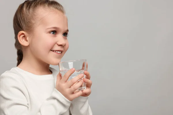 Happy Little Girl Holding Glass Fresh Water Light Grey Background Stock Picture