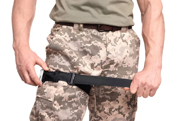 Soldier Military Uniform Applying Medical Tourniquet Leg White Background Closeup — Stock Photo, Image