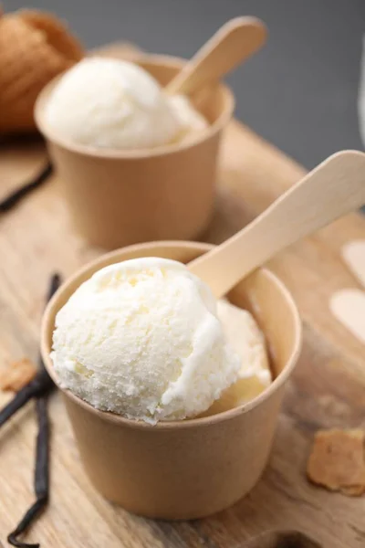 Paper Cups Delicious Ice Cream Vanilla Pods Wooden Board Closeup — Stock Photo, Image